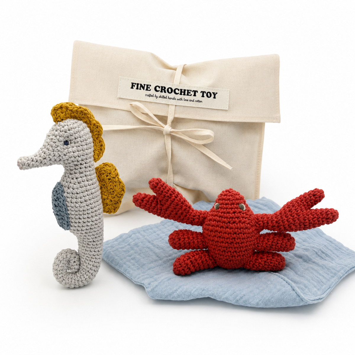 coffret cadeau bébé jouet hochet hippocampe et doudou crabe